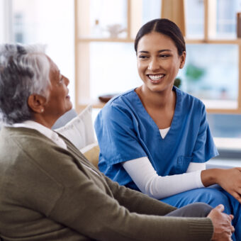 healthcare, happy and a nurse talking to an old woman in a nursing home during a visit or checkup. medical, smile and a female medicine professional having a conversation with a senior resident